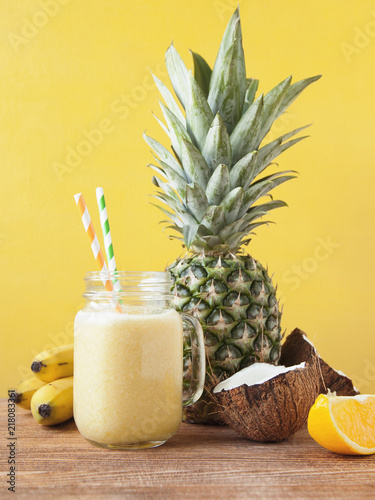 Fresh exotic smoothie with fruits and coconut milk.