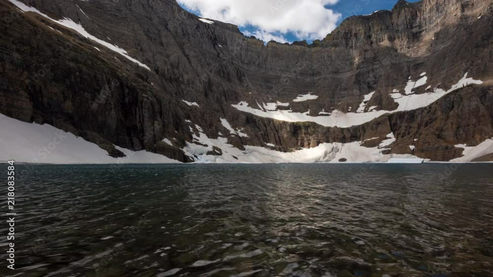TL Glacier - Iceberg Lake Low with Light Changing Color of the Lake TL Glacier - Iceberg Lake Low with Light Changing Color of the Lake