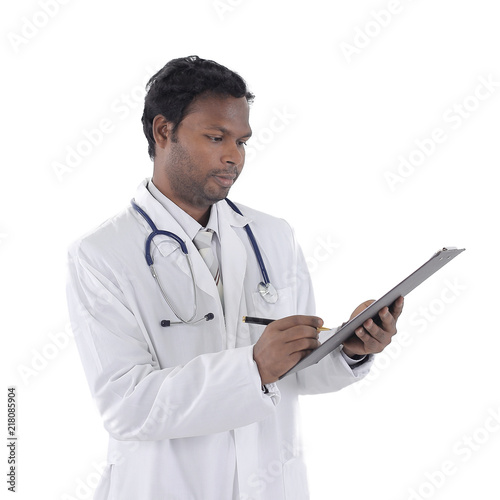 General practitioner writing a prescription for a patient