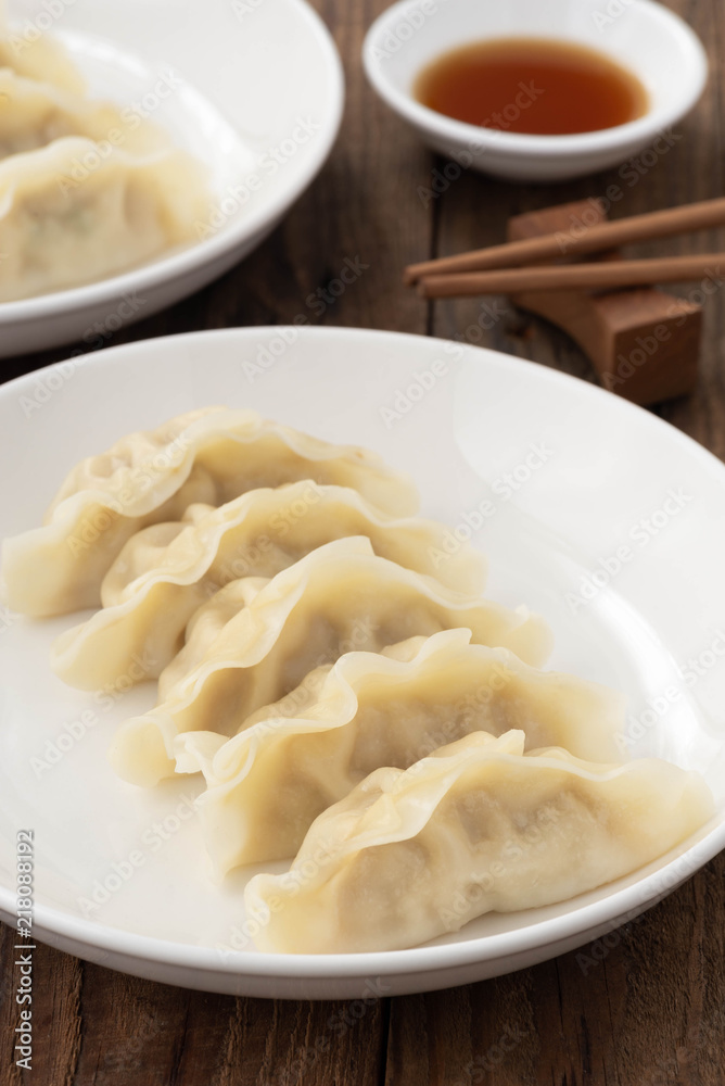Japanese Gyoza with pork meat and on a plate Japanese Gyoza with pork meat and on a plate