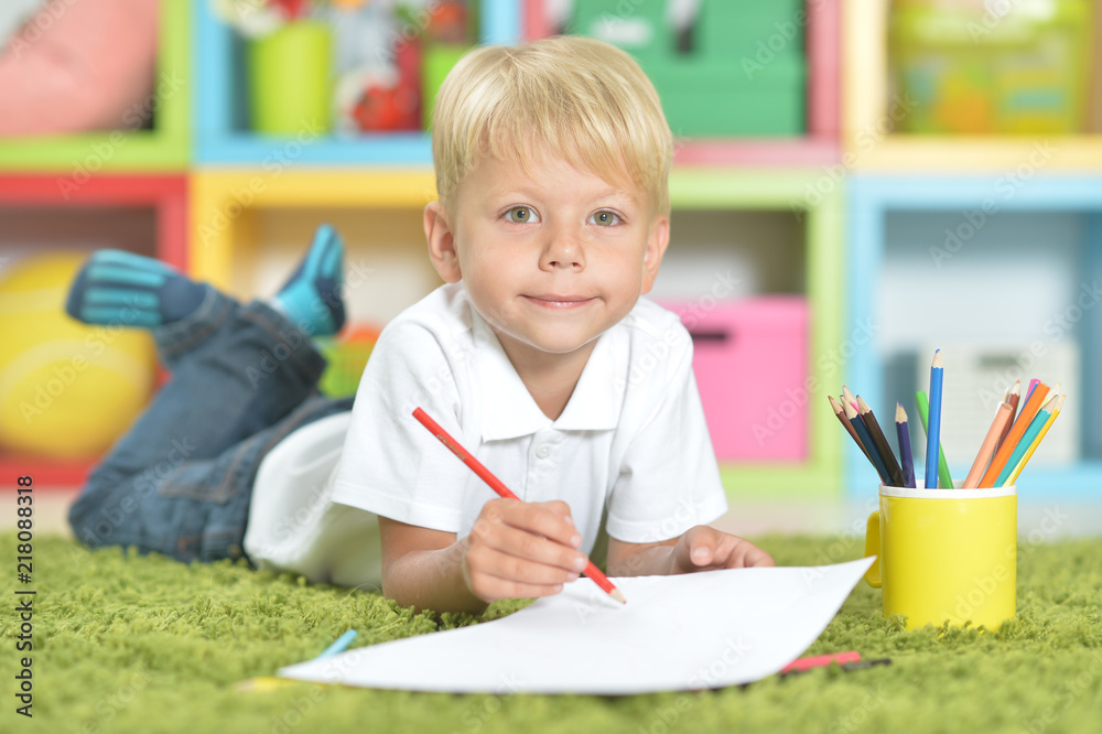 Portrait of little boy drawing with pencils Portrait of little boy drawing with pencils