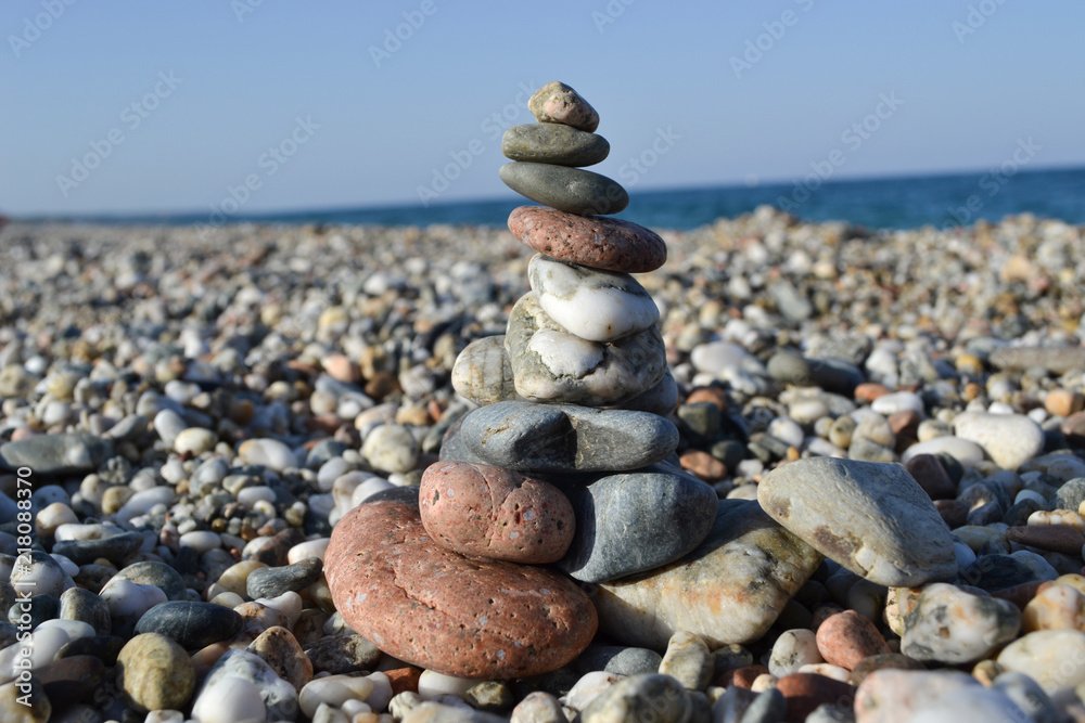 Colorful sea pebbles - Beautiful round stones on the beach Colorful sea pebbles - Beautiful round stones on the beach