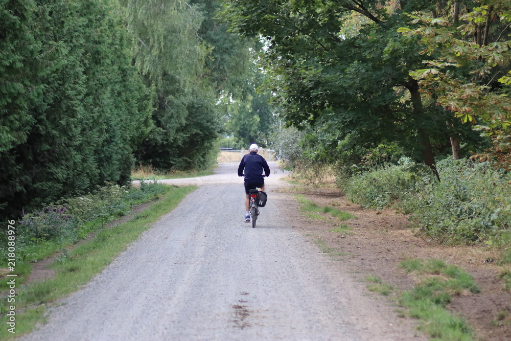 Old men is biking