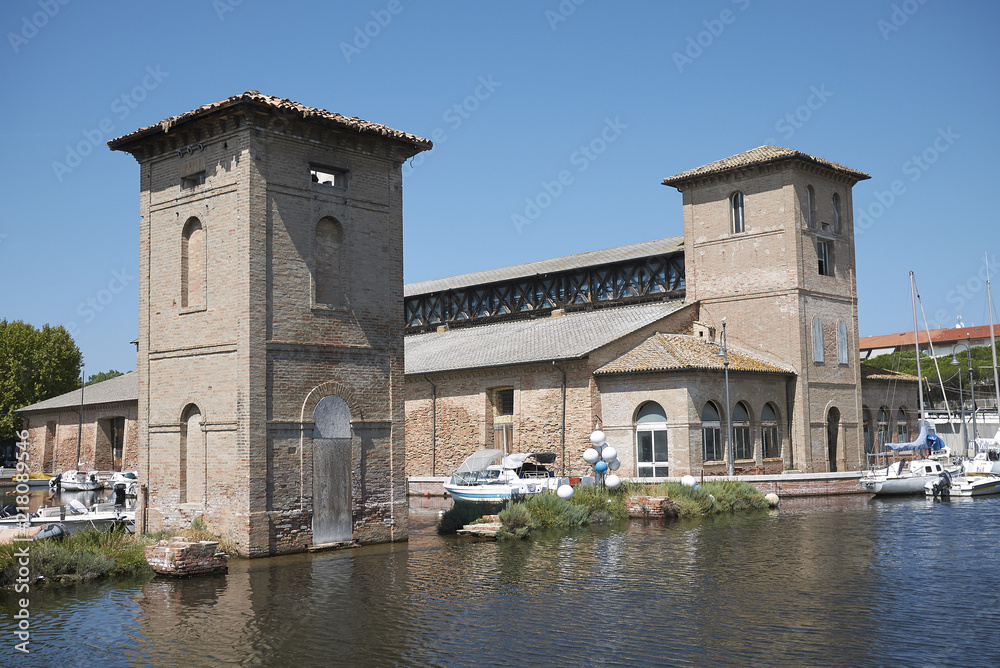 Cervia, Italy - August 04, 2018 : Darsena salt storehouse (Magazzini del sale)