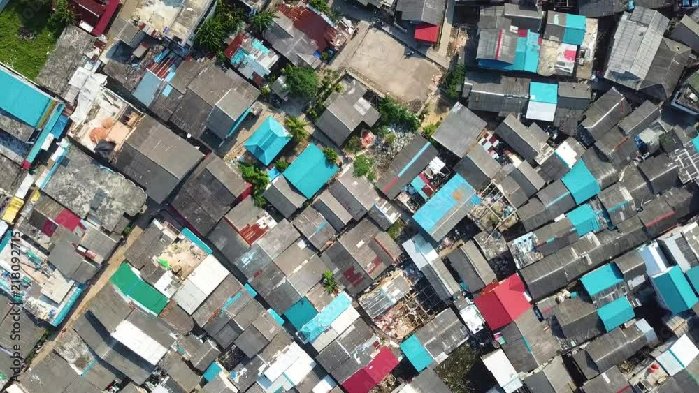 Drone flight over a fishing village/slum in Batam, Indonesia. Drone flight over a fishing village/slum in Batam, Indonesia.