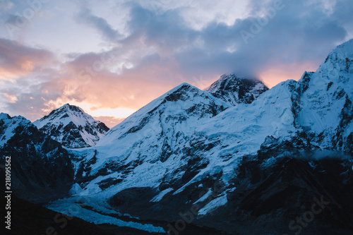 Evening view of mountains with beautiful sky on the way to Everest base camp, Khumbu valley, Sagarmatha national park, Everest area, Nepal. Sunrise over mountains ridge. Snowy mountains. Sunset time.