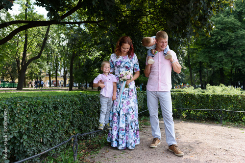 happy caucasian family in park