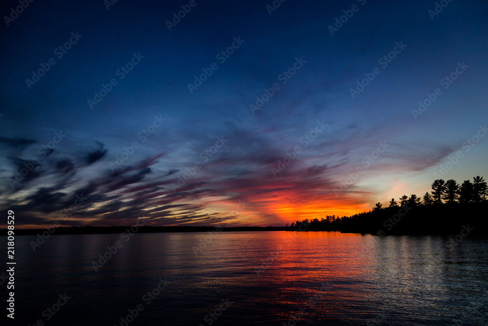 Sunset against cirrus clouds on Lake Rosseau.