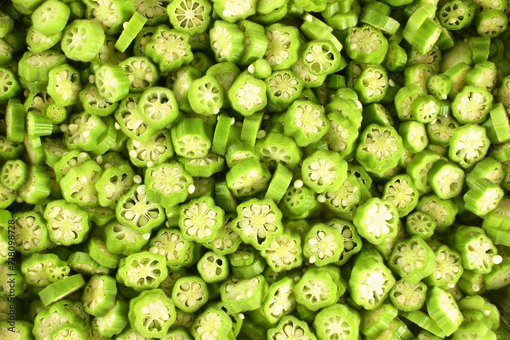 cut or slice fresh Lady Fingers or Okra vegetable cut or slice fresh Lady Fingers or Okra vegetable