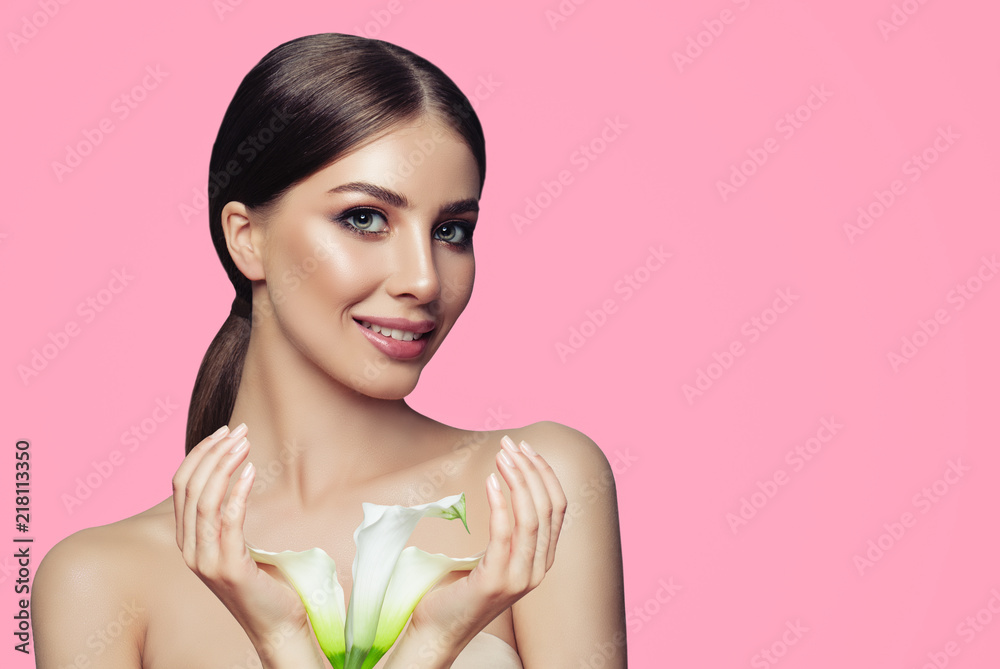 Spa woman with healthy skin, manicured hands and white flowers. Facial treatment, cosmetology and spa Spa woman with healthy skin, manicured hands and white flowers. Facial treatment, cosmetology and spa