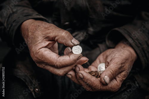 Concept Sanction poverty in Russia. Old hands hold ruble