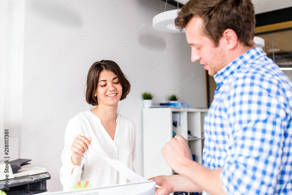 Fototapeta premium Business partners work with documents in a modern office