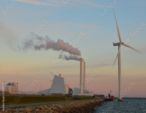Photography Power plant and windmill on the sea-shore of Denmark