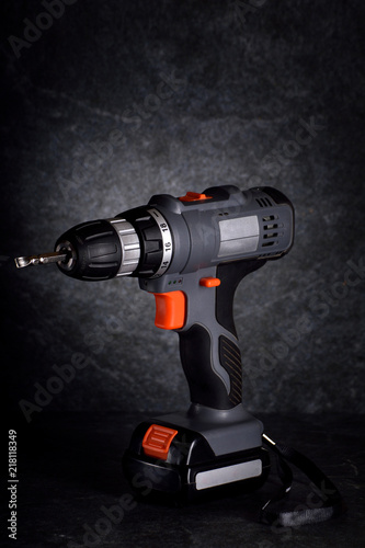  Close up Electric drill on rock table background and copy space.