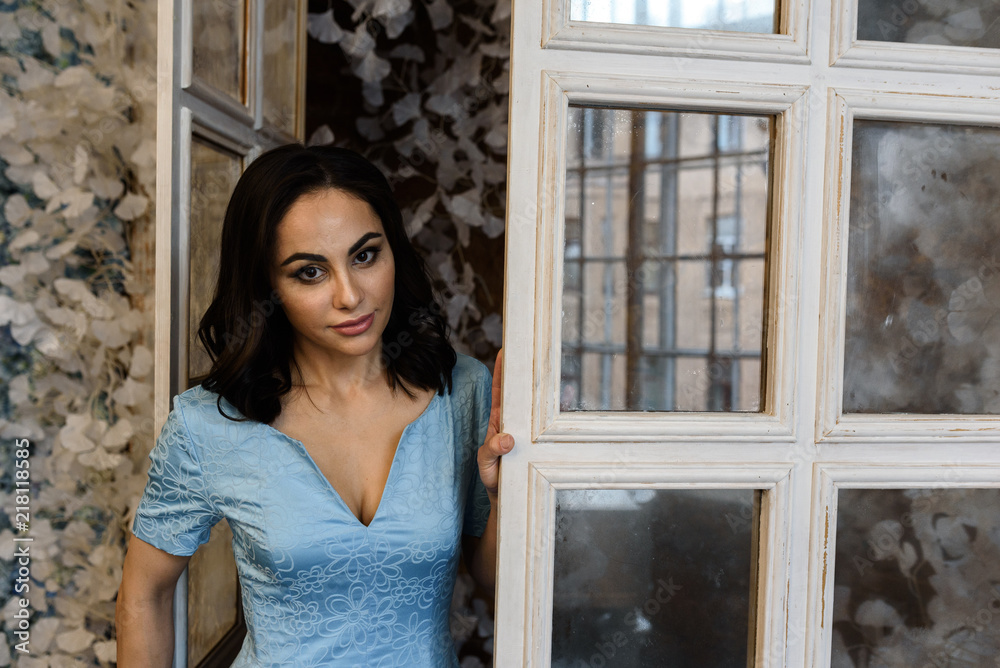 woman in blue dress woman in blue dress