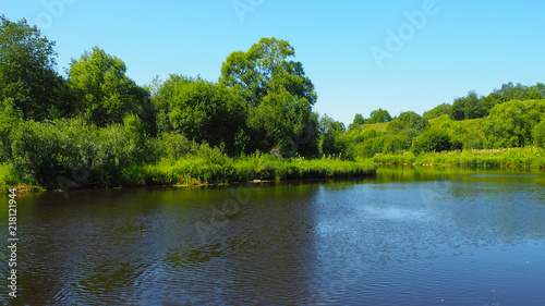 Landscape of the lake and forest on a Sunny day. Nature of Northern latitudes in summer.  