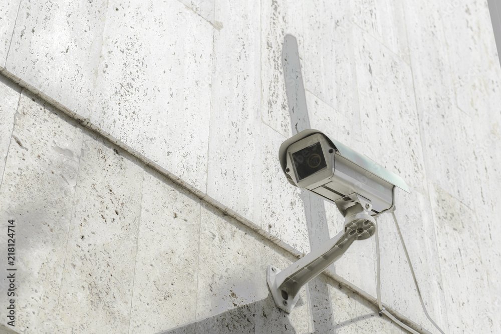 Optical CCTV camera surveillance security camera video equipment in tower home and house building on the modern building wall for safety system area control outdoor with copyspace. Private property Optical CCTV camera surveillance security camera video equipment in tower home and house building on the modern building wall for safety system area control outdoor with copyspace. Private property