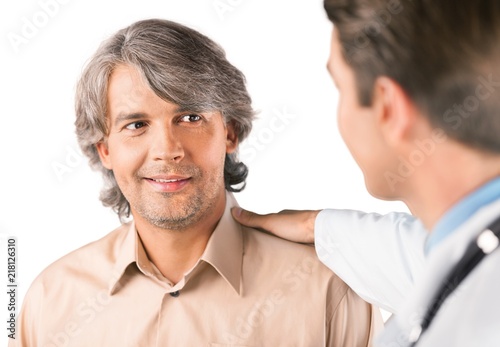 Portrait of a Mature Man Talking with a Doctor