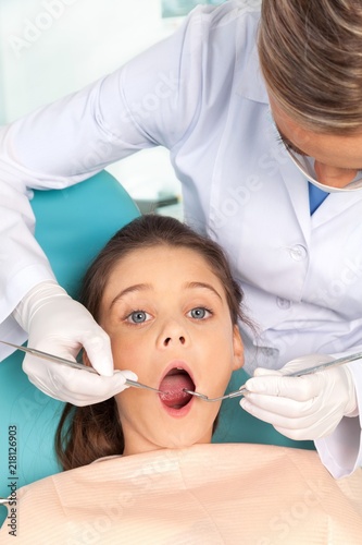 Portrait of a Young Girl Having A Dentist Examination