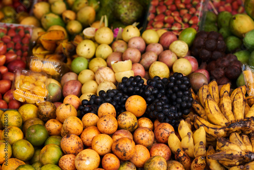 Fototapeta Naklejka Na Ścianę i Meble -  Asian farm market, fresh colorful ripe fruit and vegetables  Different fresh farm fruit and vegetables. Autumn harvest and healthy organic food concept.