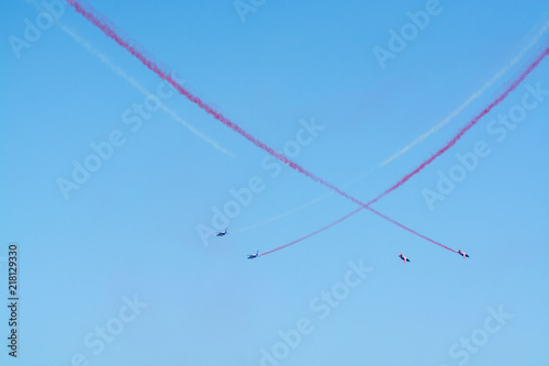 Toulon rade, FRANCE - August 15, 2018: Patrouille de France aerobatics team, famous demonstration of French Air force, Alpha jets of Patrouille de France in full formation.