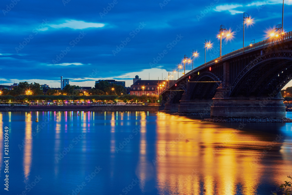 Theodor-Heuss bridge of Mainz in the blue hour with light reflection and part of Mainz castle