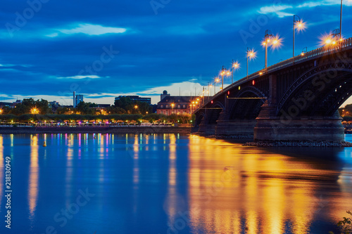 Theodor-Heuss bridge of Mainz in the blue hour with light reflection and part of Mainz castle © Claudia Nass