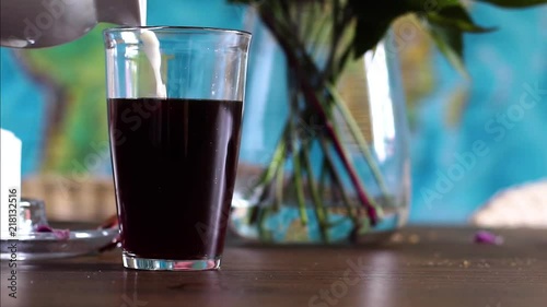 this clip shows milk being poured into a glass filled with coffee, you can really follow the nice flow in 40% slowmotion photo