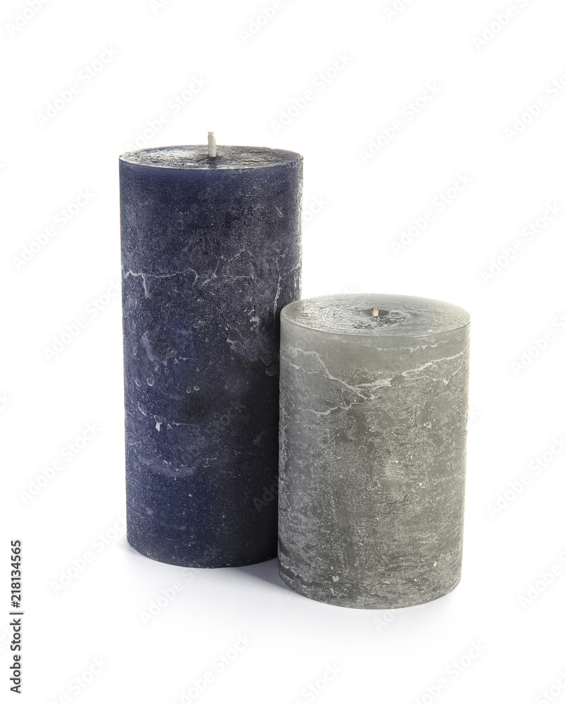 Two decorative wax candles on white background Two decorative wax candles on white background
