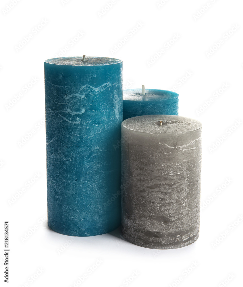 Different decorative wax candles on white background Different decorative wax candles on white background