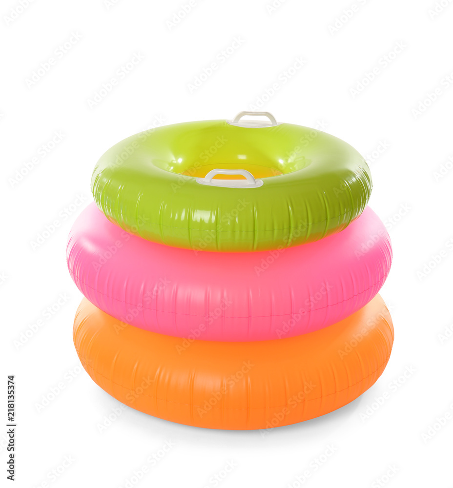 Naklejka premium Different inflatable rings on white background. Summer holidays