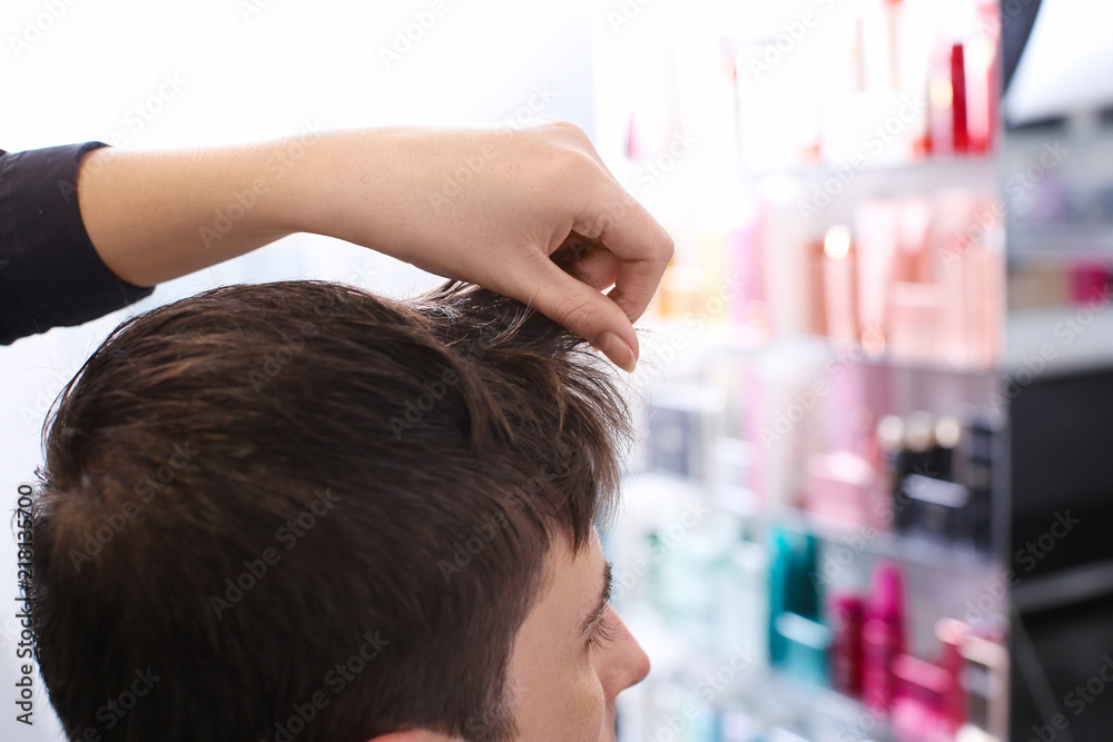 Female hairdresser with client in salon Female hairdresser with client in salon