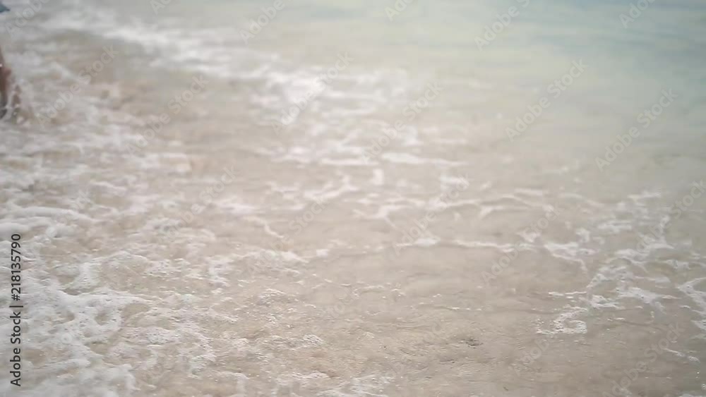 Girl walking on beach Girl walking on beach