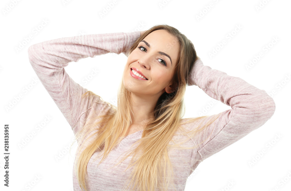 Beautiful smiling woman posing against white background Beautiful smiling woman posing against white background