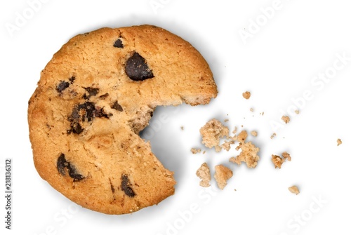 Partially eaten chocolate chip cookie