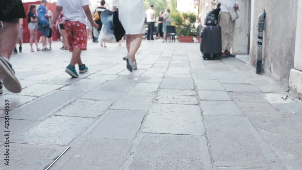 People walking through the streets of Venice. People walking through the streets of Venice.