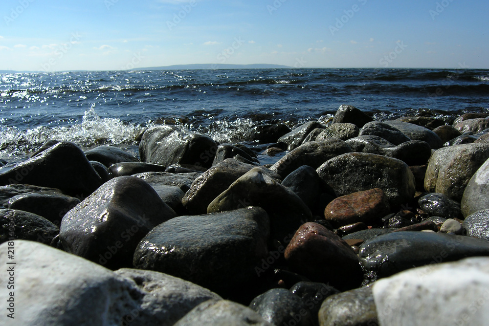 The river bank with a large pebble.