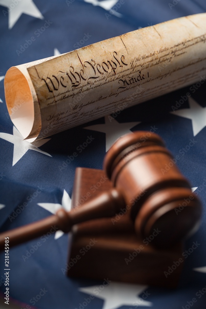 Fototapeta premium Gavel on American Flag with Constitution