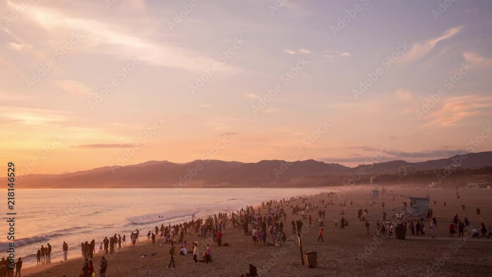 Time Lapse of Santa Monica Beach at Sunset with lots of tourist and beach goers. Time Lapse of Santa Monica Beach at Sunset with lots of tourist and beach goers.