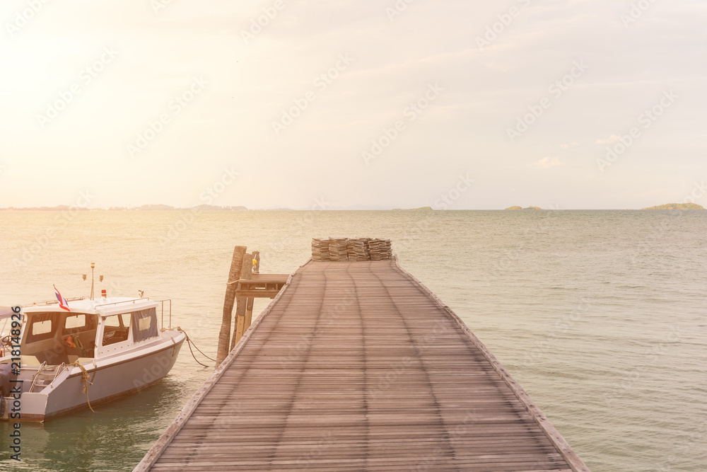 Naklejka premium The wooden bridge in the sea