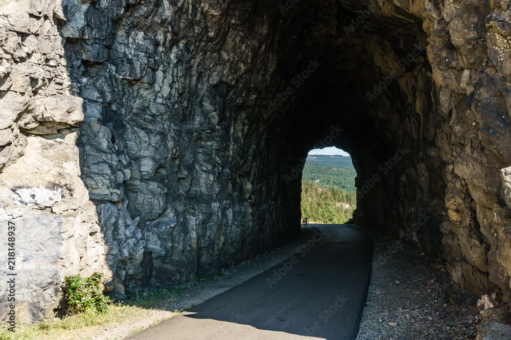 Little Tunnel Kettle Valley Railway biking trail summer near Penticton British Columbia Canada.