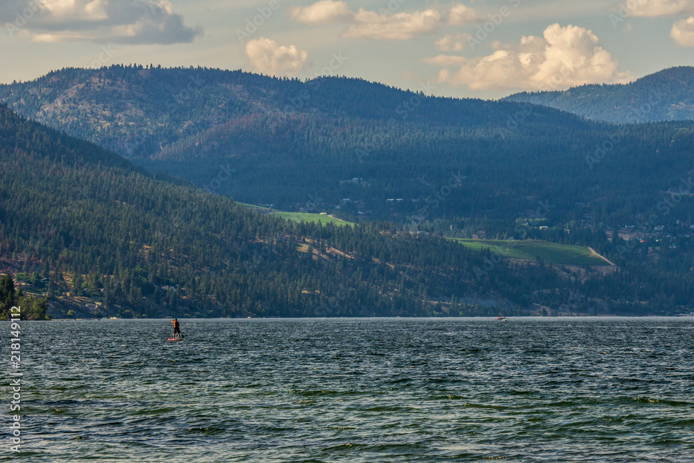 Okanagan lake at summer day with clouds on the sky. Okanagan lake at summer day with clouds on the sky.