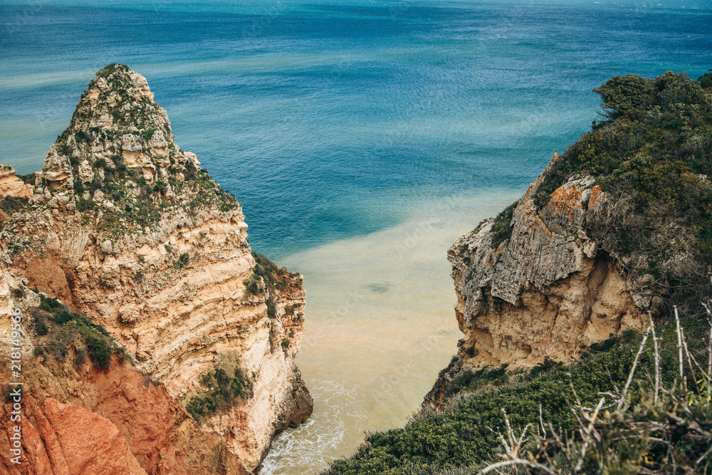 Beautiful views of the Atlantic Ocean and the rocks off the coast of Portugal next to the city called Lagos. Amazing natural landscape. Beautiful views of the Atlantic Ocean and the rocks off the coast of Portugal next to the city called Lagos. Amazing natural landscape.