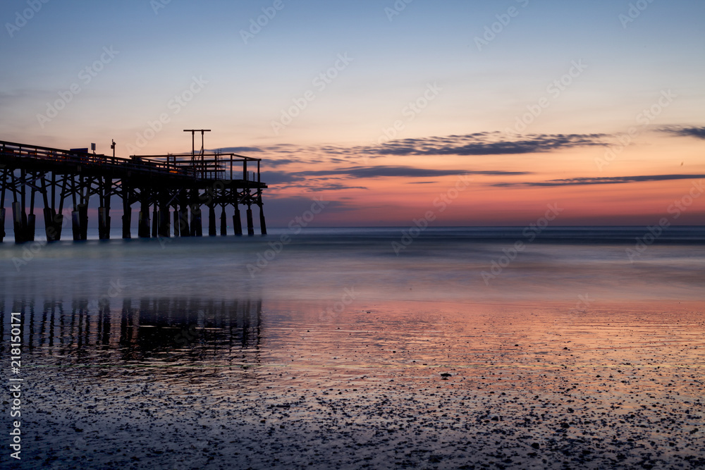 Early sunrise at the pier in Cocoa Beach, Florida