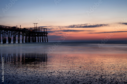 Early sunrise at the pier in Cocoa Beach  Florida