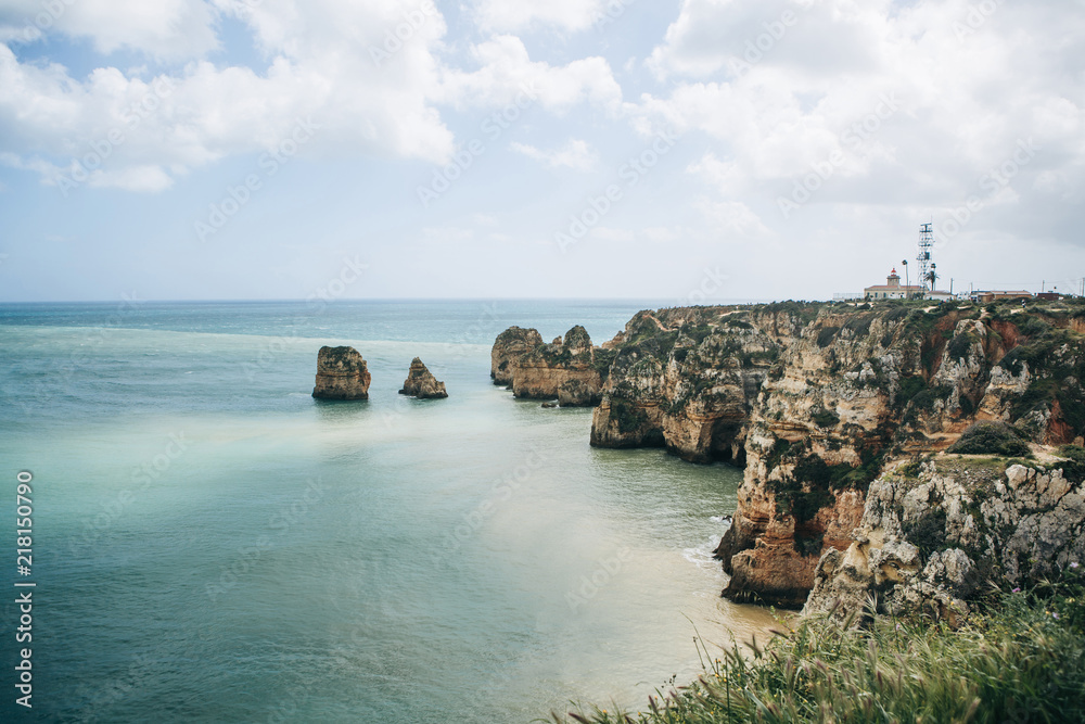 Beautiful views of the Atlantic Ocean and the rocks off the coast of Portugal next to the city called Lagos. Amazing natural landscape. Beautiful views of the Atlantic Ocean and the rocks off the coast of Portugal next to the city called Lagos. Amazing natural landscape.