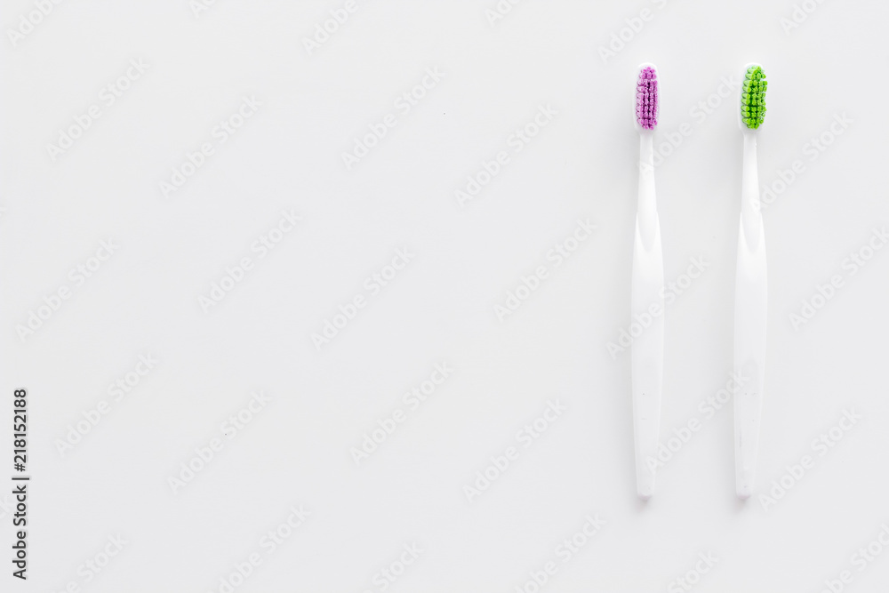 Clean teeth. Toothbrushes on white background top view copy space Clean teeth. Toothbrushes on white background top view copy space