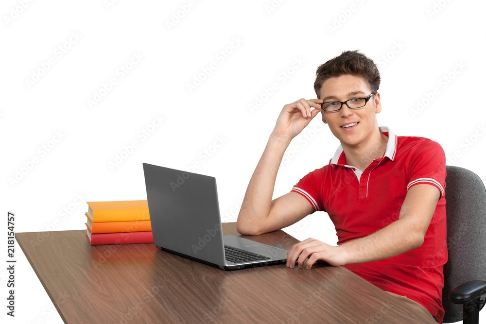 Portrait of young man using laptop isolated on white background Portrait of young man using laptop isolated on white background