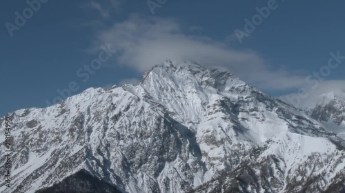 Timelapse of Mount Chaberton, 3130 mt. with clouds on the top. Alps, Italy. Winter. Timelapse photo