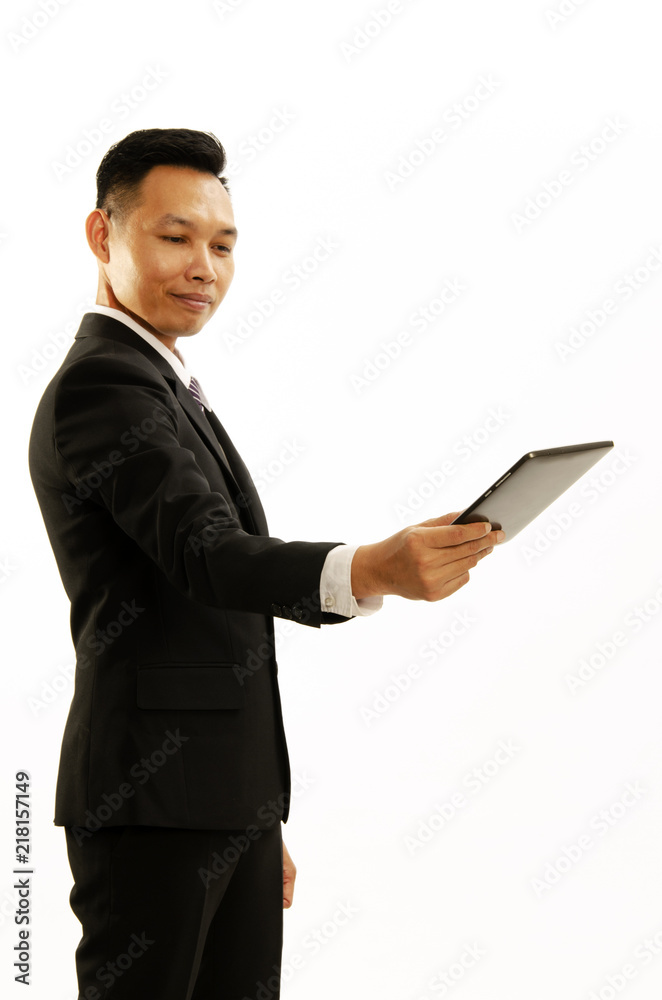 Asian Business man hand holding tablet and giving toward of Isolated on white backgrounds Asian Business man hand holding tablet and giving toward of Isolated on white backgrounds